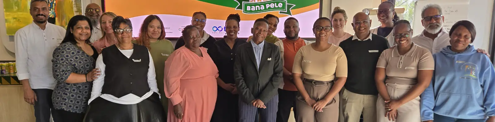 Group photo of the Digital Backbone workshop participants standing together.
